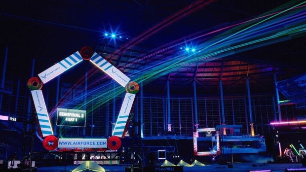 DRL Drones race through the US Air Force gate during the 2022-23 DRL Algorand World Championship Season in Miami. Source: The Drone Racing League
