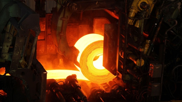 <p>Red-hot rolled steel coil at a steel mill in Espirito Santo, Brazil.</p>