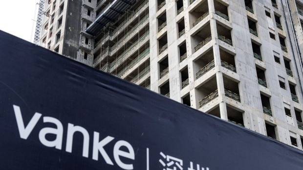 Vanke told brokerages that it’s making plans to resolve liquidity pressure and short-term operational difficulties. Photographer: Qilai Shen/Bloomberg