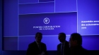 Signage is displayed on a screen during the Power Corp. of Canada (PCC) annual general meeting in Toronto, Ontario, Canada, on Tuesday, May 14, 2019. PCC, the second-largest company in the U.S. 401(k) pension business, plans to keep buying companies that fit with its strategy.