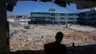 <p>Displaced Palestinians in the remains of a United Nations Relief and Works Agency (UNRWA) school in central Khan Younis, Gaza, on May 7.</p>