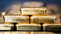 Gold bars sit stacked in this arranged photograph in Hungary. Photographer: Bloomberg Creative Photos/Bloomberg