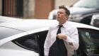 Elon Musk, chief executive officer of Tesla Inc., arrives at court during the SolarCity trial in Wilmington, Delaware, U.S., on Tuesday, July 13, 2021. Musk was cool but combative as he testified in a Delaware courtroom that Tesla's more than $2 billion acquisition of SolarCity in 2016 wasn't a bailout of the struggling solar provider. Photographer: Al Drago/Bloomberg