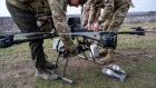 UNSPECIFIED, UKRAINE - FEBRUARY 21: Ukrainian soldiers of the 108th Territorial Defense Brigade test fly a Ukrainian-made Vampire drone, with six rotors, night vision and thermal imaging capabilities, and capable of carrying four 82mm artillery shells, near the southern frontline on February 21, 2024 in UNSPECIFIED, Zaporizhzhia Oblast, Ukraine. Russian forces have been mounting multiple attacks each day along the 600-mile frontline, while Ukrainian troops grapple with a shortage of ammunition and manpower. (Photo by Scott Peterson/Getty Images) Photographer: Scott Peterson/Getty Images Europe