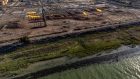 An oil field and facility near Iraq's southern port city of Basra.. Photographer: Hussein Faleh/AFP/Getty Images